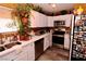 Modern kitchen, white cabinets, stainless steel appliances at 1303 Darlene Way # 102B, Boulder City, NV 89005