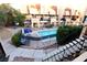 Community pool area with surrounding buildings and walkways at 1303 Darlene Way # 102B, Boulder City, NV 89005
