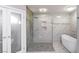 Elegant bathroom with a glass-enclosed shower, soaking tub, and upscale finishes at 1630 Westwood Dr, Las Vegas, NV 89102