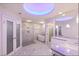Luxurious bathroom featuring a soaking tub, glass shower, and modern lighting at 1630 Westwood Dr, Las Vegas, NV 89102