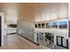Bright and airy hallway with wood flooring and a view overlooking the entryway at 1630 Westwood Dr, Las Vegas, NV 89102
