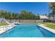 The backyard features a sparkling pool with a slide and well-maintained landscaping at 1630 Westwood Dr, Las Vegas, NV 89102