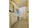 Bathroom boasts a modern vanity, wood-look floors, and well-organized storage at 2600 Congress Ave, Las Vegas, NV 89121