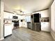Updated kitchen with modern appliances, sleek white cabinets, and plenty of counter space for cooking and entertaining at 2600 Congress Ave, Las Vegas, NV 89121