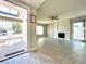 Bright living room featuring a fireplace and tiled flooring, perfect for entertaining and relaxation at 2600 Congress Ave, Las Vegas, NV 89121