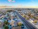 Aerial view of house with pool, showcasing surrounding neighborhood at 4299 E Twain Ave, Las Vegas, NV 89121