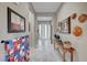 Bright entryway with tile flooring and decorative wall hangings at 4829 E Beacon Ridge Dr, Pahrump, NV 89061