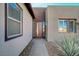 Front entry with modern door and stone pathway at 4829 E Beacon Ridge Dr, Pahrump, NV 89061