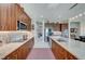 Modern kitchen with stainless steel appliances and granite countertops at 4829 E Beacon Ridge Dr, Pahrump, NV 89061