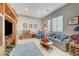 Relaxing living room featuring a sofa, coffee table, and built-in shelving at 4829 E Beacon Ridge Dr, Pahrump, NV 89061