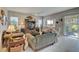 Spacious living room featuring comfortable seating and a large TV at 4829 E Beacon Ridge Dr, Pahrump, NV 89061