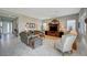 Open living room with comfortable seating and views to entry at 4829 E Beacon Ridge Dr, Pahrump, NV 89061
