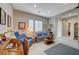 Cozy living room featuring comfortable seating and a charming, vintage aesthetic at 4829 E Beacon Ridge Dr, Pahrump, NV 89061