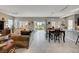 Open living area with adjacent dining and kitchen areas at 4829 E Beacon Ridge Dr, Pahrump, NV 89061