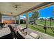 Covered patio with seating area, overlooking a golf course at 4829 E Beacon Ridge Dr, Pahrump, NV 89061