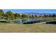 Serene pond with fountain and mountain backdrop at 4829 E Beacon Ridge Dr, Pahrump, NV 89061