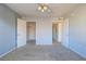 Bedroom with double closets and neutral carpeting at 5710 E Tropicana Ave # 2017, Las Vegas, NV 89122