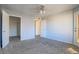 Primary bedroom with access to private bathroom and walk in closet at 5710 E Tropicana Ave # 2017, Las Vegas, NV 89122