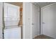 Stackable washer and dryer in a compact laundry closet at 5710 E Tropicana Ave # 2017, Las Vegas, NV 89122