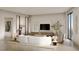 Spacious living room with modern furniture and city views at 700 W Carson Ave # 808, Las Vegas, NV 89106