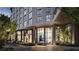 Elegant building entrance with artwork and seating at 700 W Carson Ave # 808, Las Vegas, NV 89106