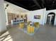 Modern lobby kitchen with yellow seating area at 700 W Carson Ave # 808, Las Vegas, NV 89106