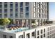 Rooftop pool with lounge chairs and city views at 700 W Carson Ave # 808, Las Vegas, NV 89106