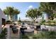 Landscaped rooftop terrace with seating and city views at 700 W Carson Ave # 808, Las Vegas, NV 89106