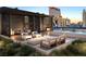 Rooftop terrace with fire pit, seating and city views at 700 W Carson Ave # 808, Las Vegas, NV 89106