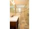 Elegant bathroom with double vanity and walk-in shower at 749 Rossmore Dr, Las Vegas, NV 89110