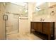 Updated bathroom with a large walk-in shower and modern vanity at 749 Rossmore Dr, Las Vegas, NV 89110