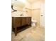 Modern bathroom with new vanity and tile flooring at 749 Rossmore Dr, Las Vegas, NV 89110