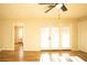 Bright bedroom with hardwood floors and access to a private patio at 749 Rossmore Dr, Las Vegas, NV 89110