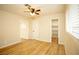 Bedroom with hardwood floors and walk-in closet at 749 Rossmore Dr, Las Vegas, NV 89110