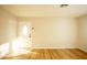 Bright entryway with hardwood floors and white door at 749 Rossmore Dr, Las Vegas, NV 89110