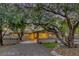 House exterior with lush landscaping and brick accents at 749 Rossmore Dr, Las Vegas, NV 89110