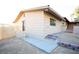 Rear exterior view of house with walkway and gate at 749 Rossmore Dr, Las Vegas, NV 89110