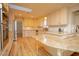 Spacious kitchen with granite countertops and stainless steel appliances at 749 Rossmore Dr, Las Vegas, NV 89110