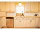 Modern kitchen featuring white cabinets and granite countertops at 749 Rossmore Dr, Las Vegas, NV 89110