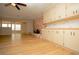 Kitchen with light cabinets and a brick fireplace at 749 Rossmore Dr, Las Vegas, NV 89110