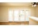 Living room with french doors and hardwood floors at 749 Rossmore Dr, Las Vegas, NV 89110