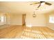 Open living room featuring hardwood floors and lots of natural light at 749 Rossmore Dr, Las Vegas, NV 89110