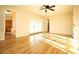 Large main bedroom with hardwood floors and access to the backyard at 749 Rossmore Dr, Las Vegas, NV 89110