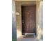 Inviting condo entry with brown door and welcoming mat at 9000 Las Vegas Blvd # 1013, Las Vegas, NV 89123