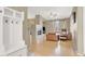 Bright entryway with a white bench and coat hooks at 913 Duckhorn Ct # 201, Las Vegas, NV 89144