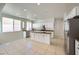 Kitchen with white cabinets, granite countertops, and stainless steel appliances at 1624 Ravanusa Dr, Henderson, NV 89052