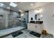 Modern bathroom with a large walk-in shower and double vanity at 1860 Ski Slope Cir, Las Vegas, NV 89117