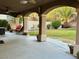 Covered patio with arched columns and a view of the backyard at 2121 Crestline Falls Pl, Las Vegas, NV 89134