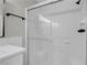 Clean bathroom with a shower/tub combo and glass enclosure at 3357 Narod St, Las Vegas, NV 89121