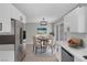 Kitchen dining area with glass table and modern chandelier at 3357 Narod St, Las Vegas, NV 89121